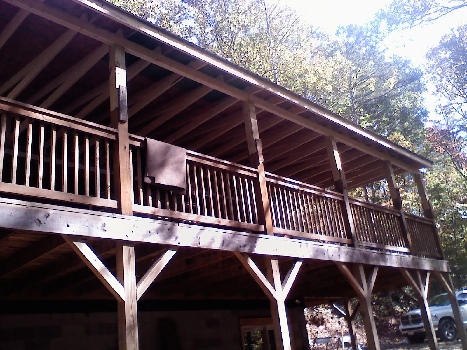 Timber framing under a new elevated porch and deck — Roof Leak Repair in Cedar Bluffs by Roofing Brothers
